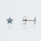 Buy Studex Tiny Tips Stainless Steel Daisy Aquamarine Stud Earrings for only $14.99 byStudex